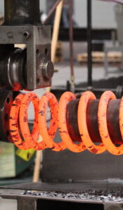 Hot wound spring manufacturing